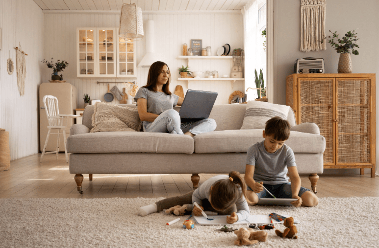 A family inside their comfortably insulated house. 